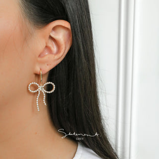 Pearl Studded Bow Dangle Earrings
