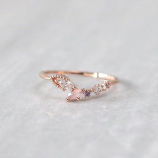Statement Grey Dove ring in rose gold featuring marquise and circle crystals in blush pink, lavender, and clear tones.