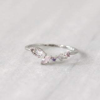 Statement Grey Dove ring featuring marquise and circle crystals in blush, rose, and lavender on a rhodium plated band.