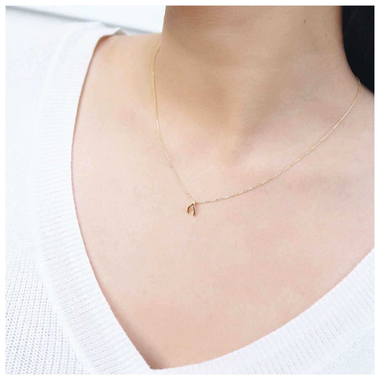 Diamond Accent Wishbone Pendant in 10K White Gold | Zales